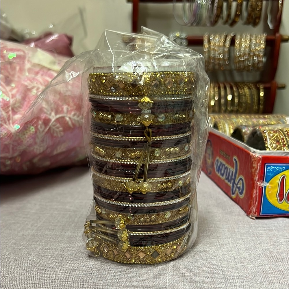 Maroon and gold metal bangles set